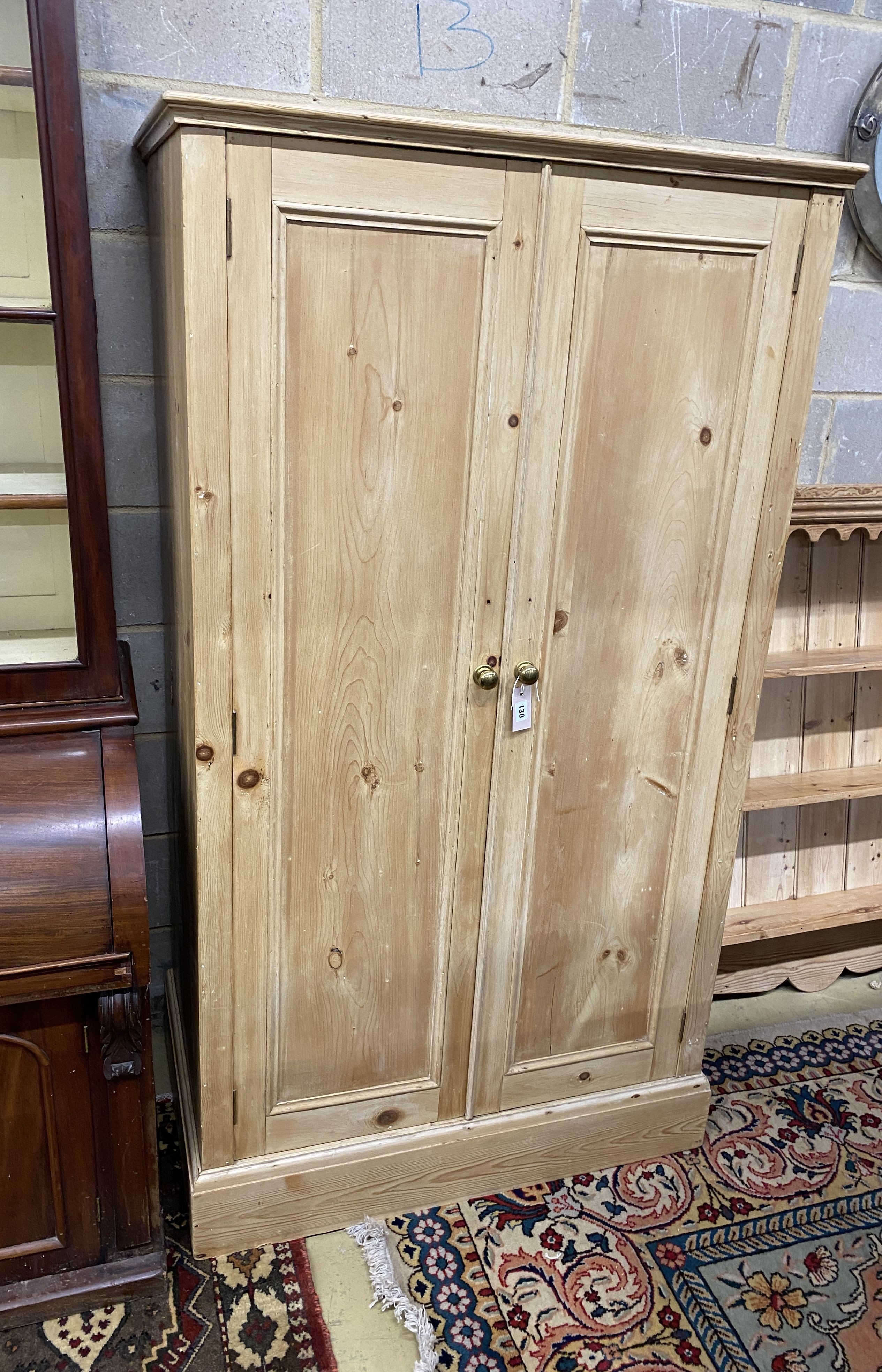 A small Victorian pine wardrobe, width 96cm, depth 59cm, height 174cm
